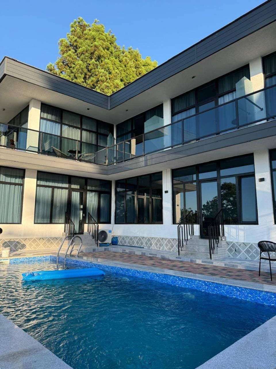 Property building, Day, Lobby or reception, Pool view, Swimming pool