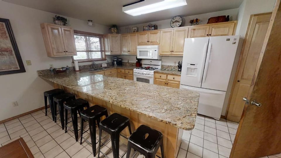 Kitchen or kitchenette, Seating area, furniture, microwave, oven, stove, toaster, kitchen