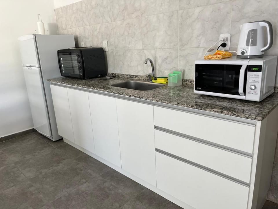 Kitchen or kitchenette, oven