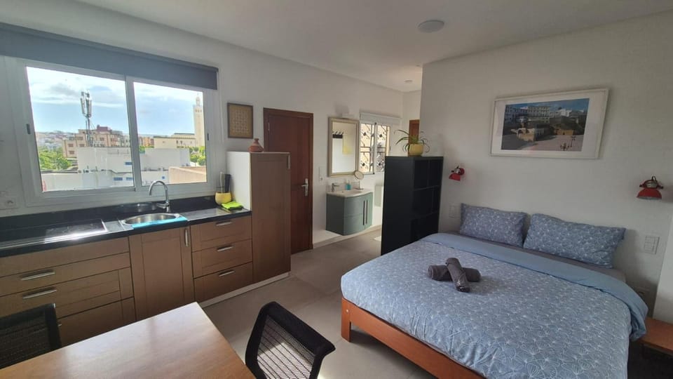 Bed, Kitchen or kitchenette, towels
