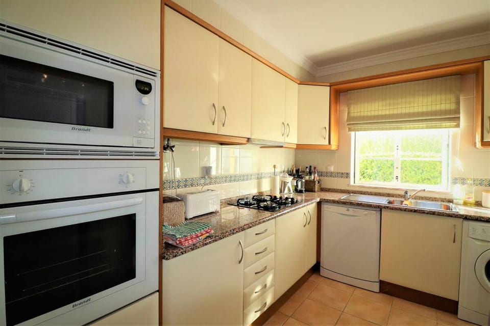 Kitchen or kitchenette, oven, stove
