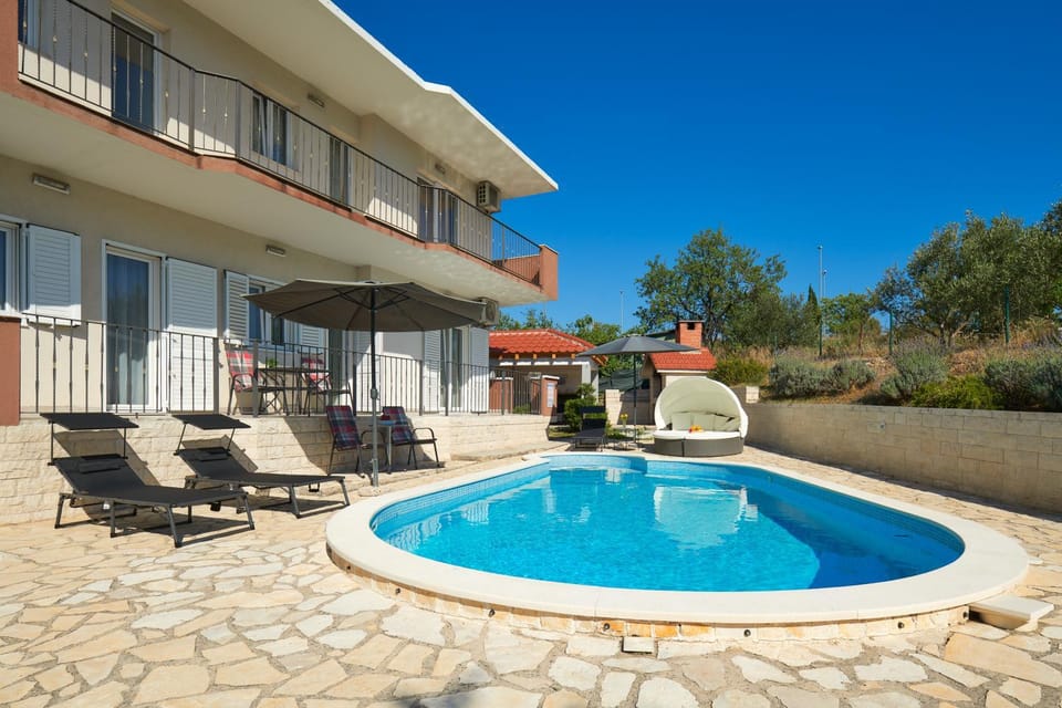 Property building, Patio, Day, View (from property/room), Balcony/Terrace, Pool view, Swimming pool, sunbed