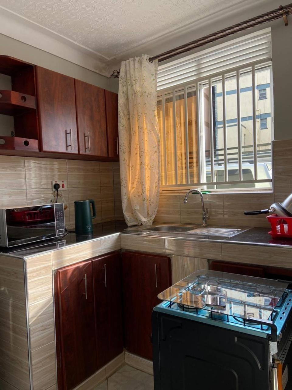 Kitchen or kitchenette, oven, stove