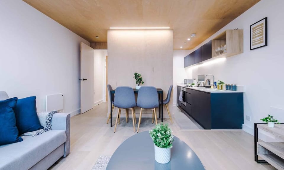 Kitchen or kitchenette, Living room, Seating area, Dining area