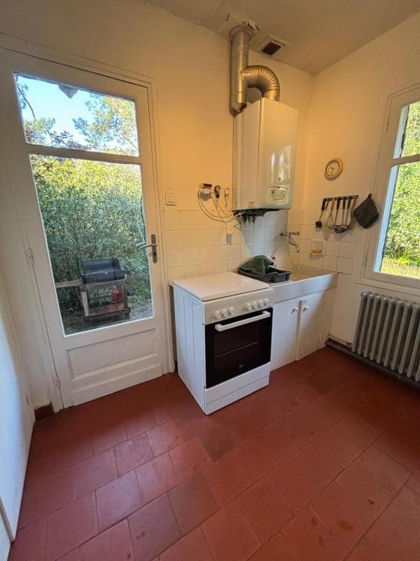 Kitchen or kitchenette, stove