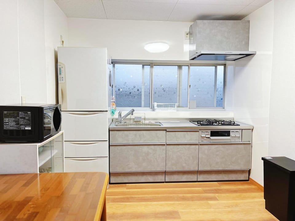 Kitchen or kitchenette, oven, stove