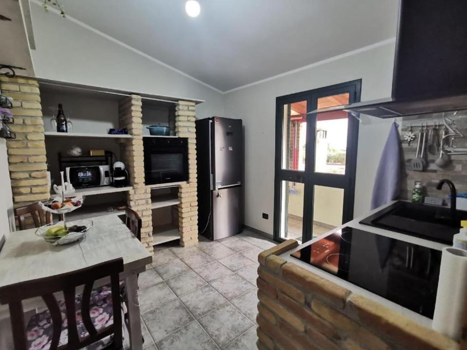 Kitchen or kitchenette, dishwasher, oven, stove