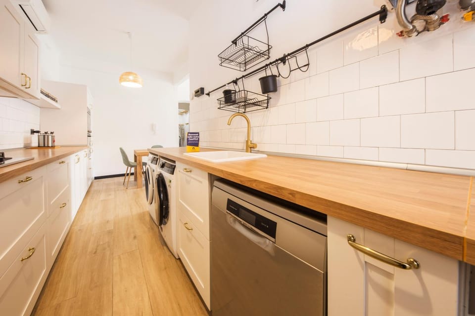 Kitchen or kitchenette, dishwasher, oven, stove, washing machine, dryer