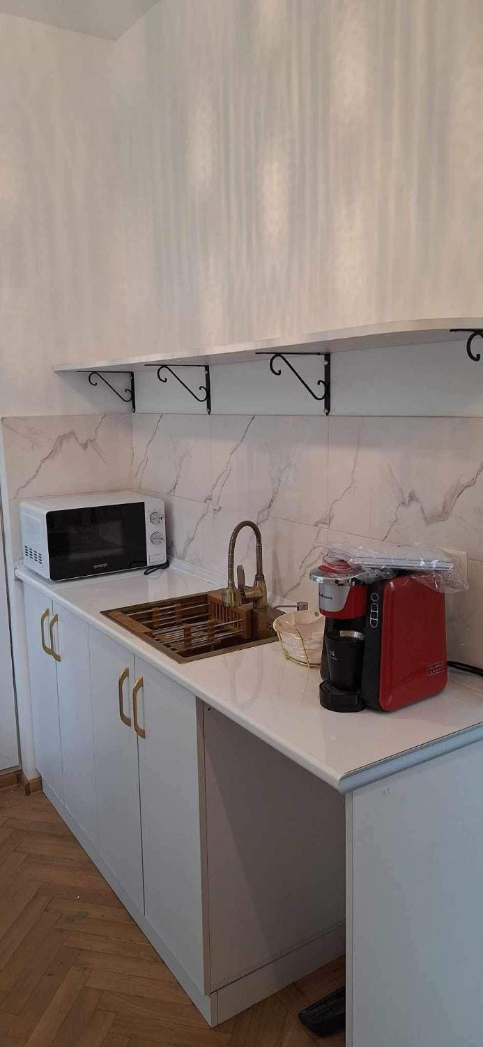 Kitchen or kitchenette, microwave