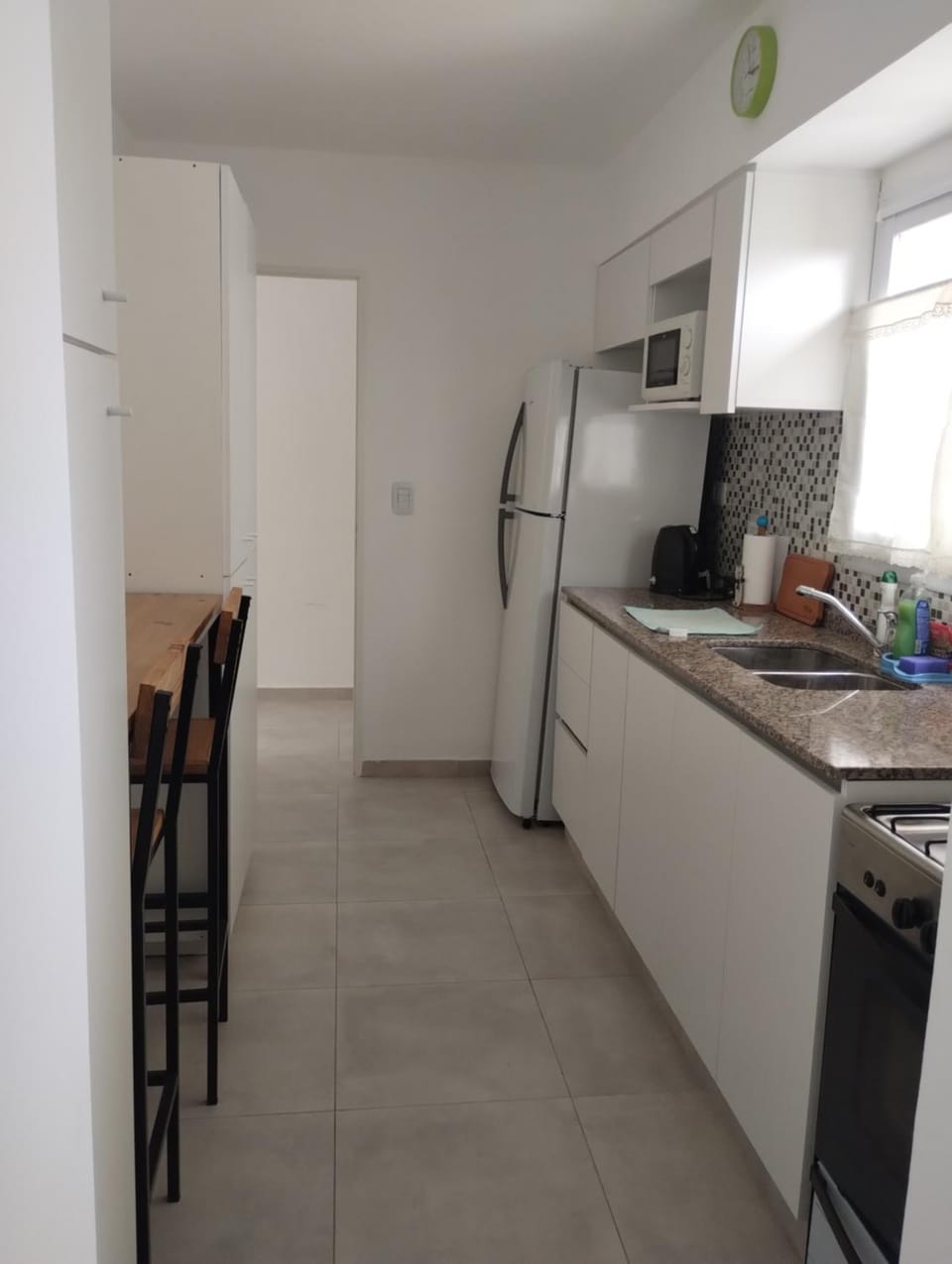 Kitchen or kitchenette, oven, stove