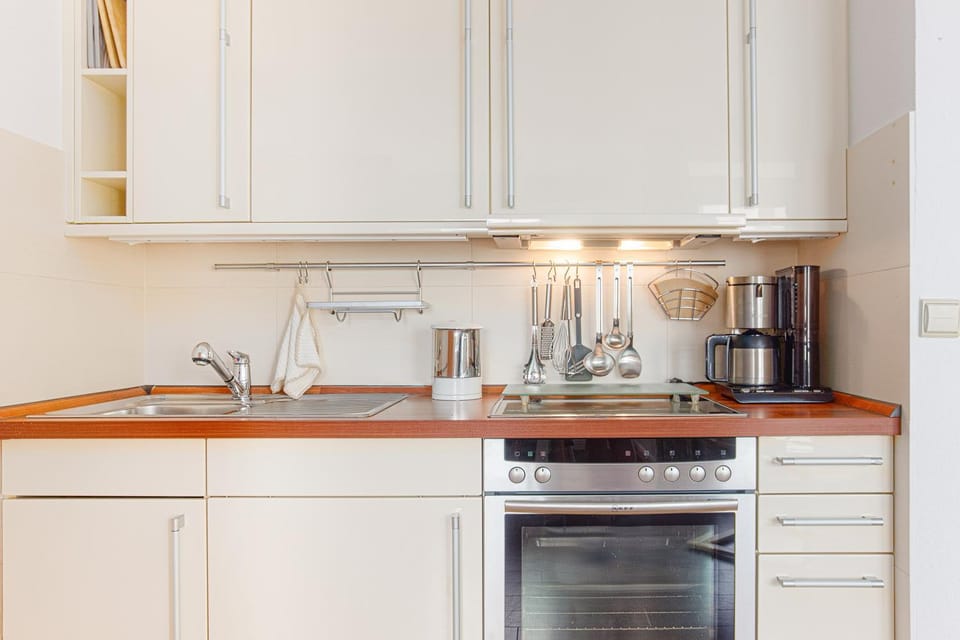 Kitchen or kitchenette, stove, kitchen