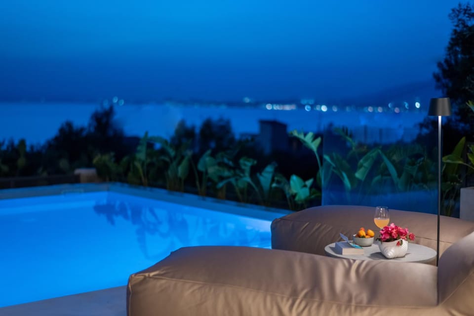Night, View (from property/room), Pool view, Sea view, Swimming pool