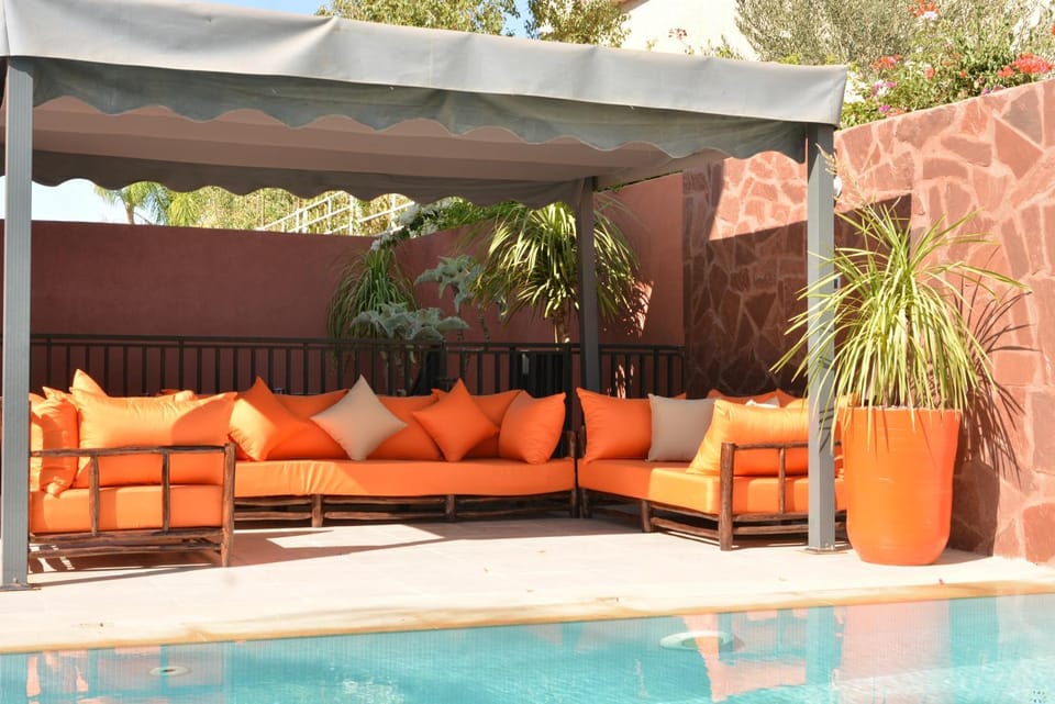 Patio, Day, Living room, Seating area, Pool view, Swimming pool, sunbed