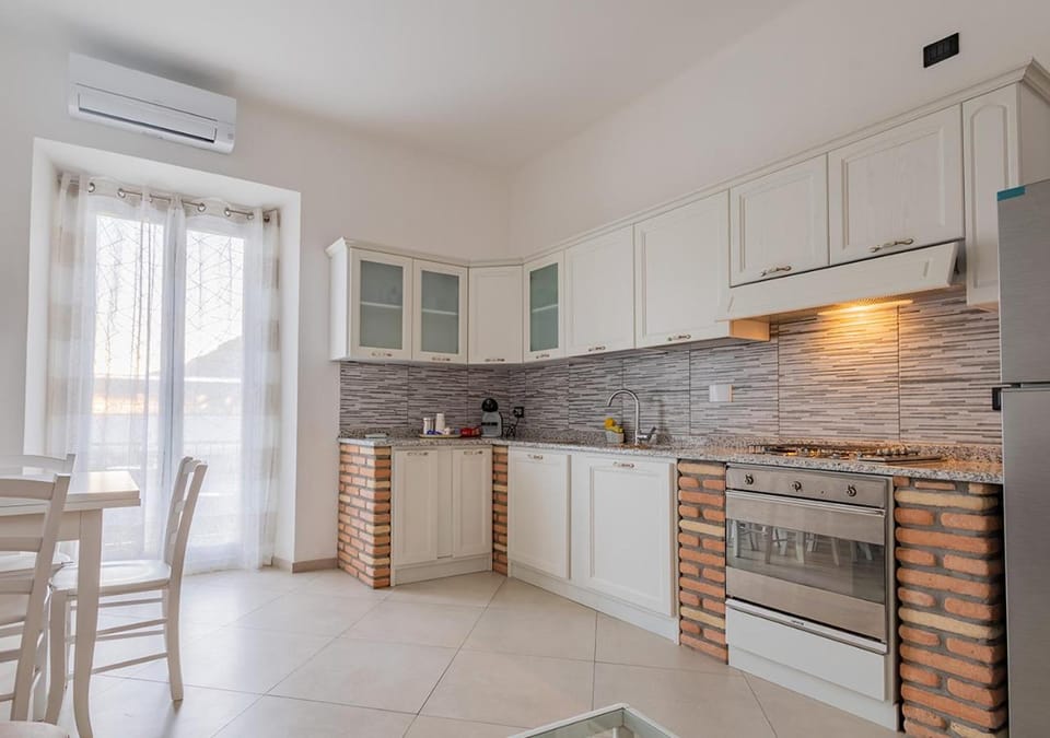 Kitchen or kitchenette, oven, stove