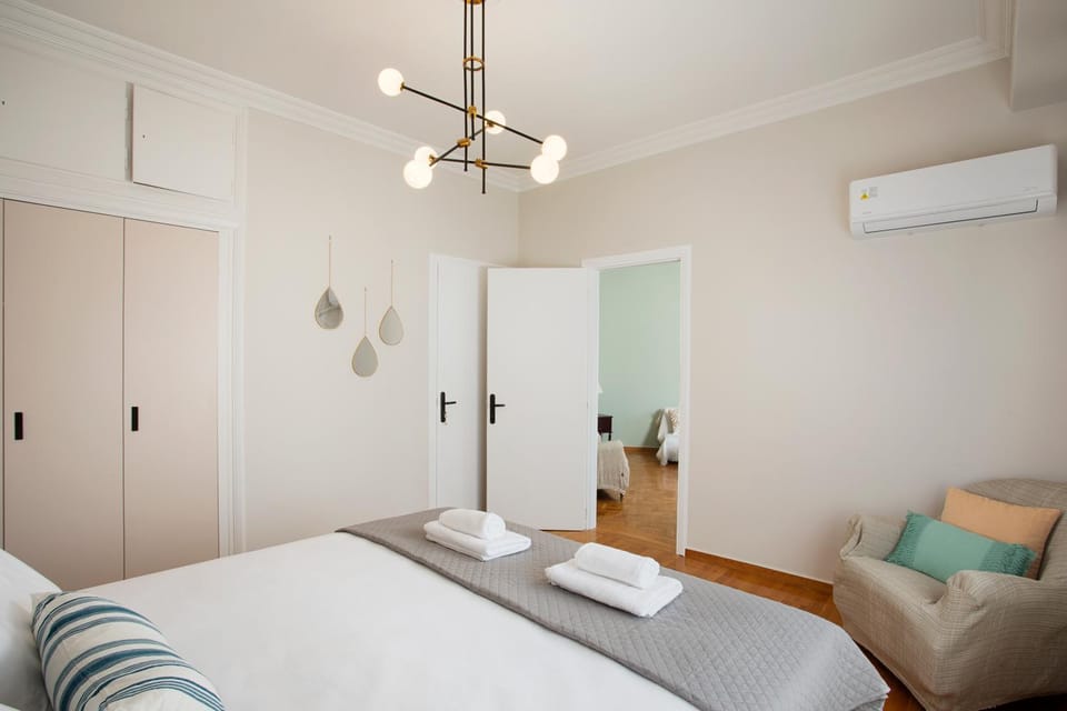 Bed, Bedroom, towels, wardrobe, air conditioner