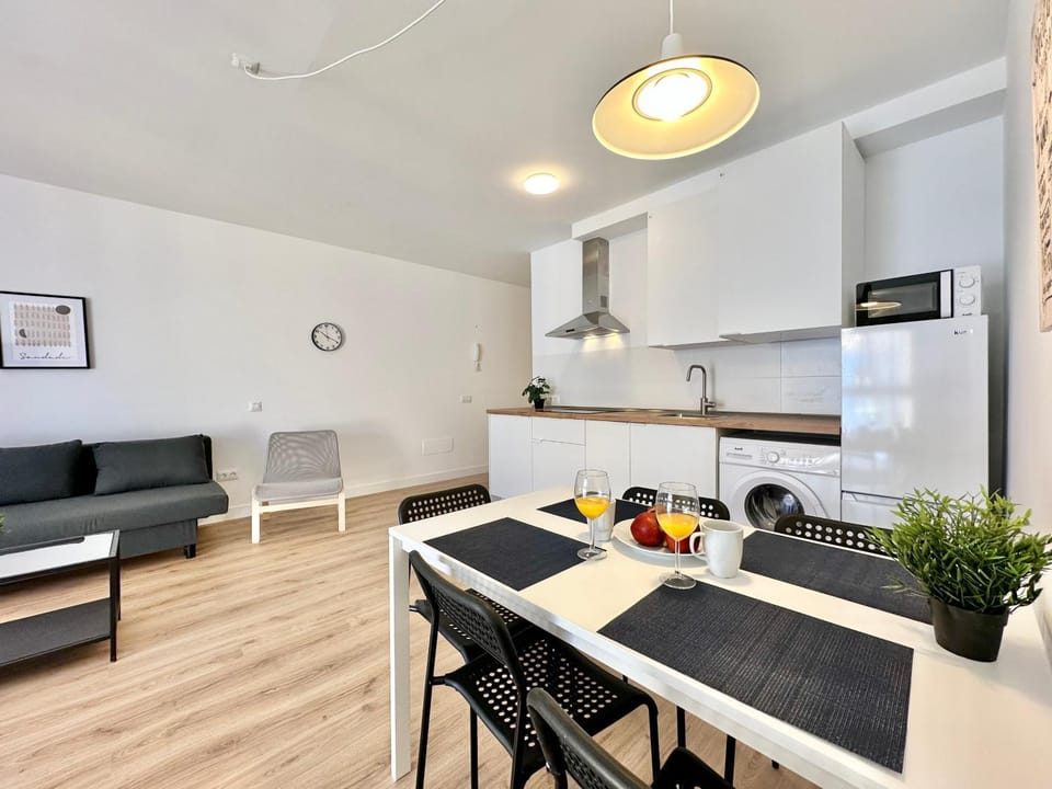 Living room, Dining area, microwave, stove, kitchen