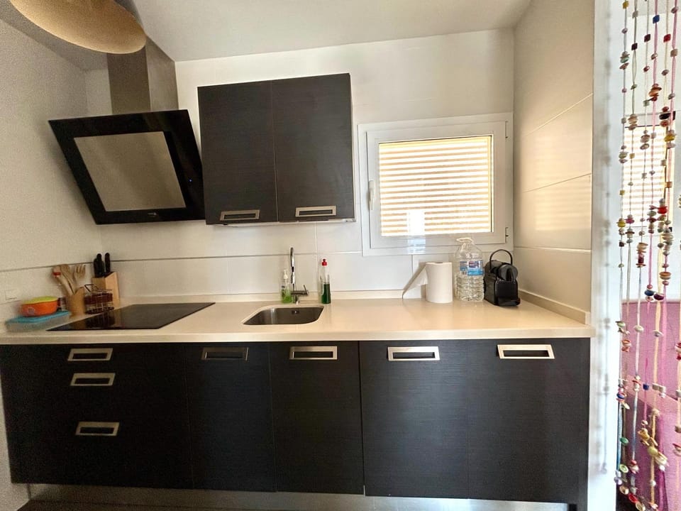Kitchen or kitchenette, stove