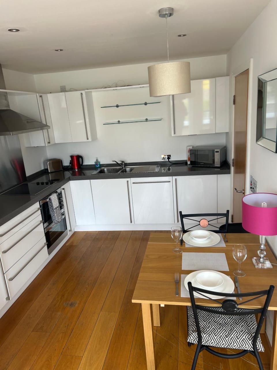 Kitchen or kitchenette, dishwasher, oven, toaster