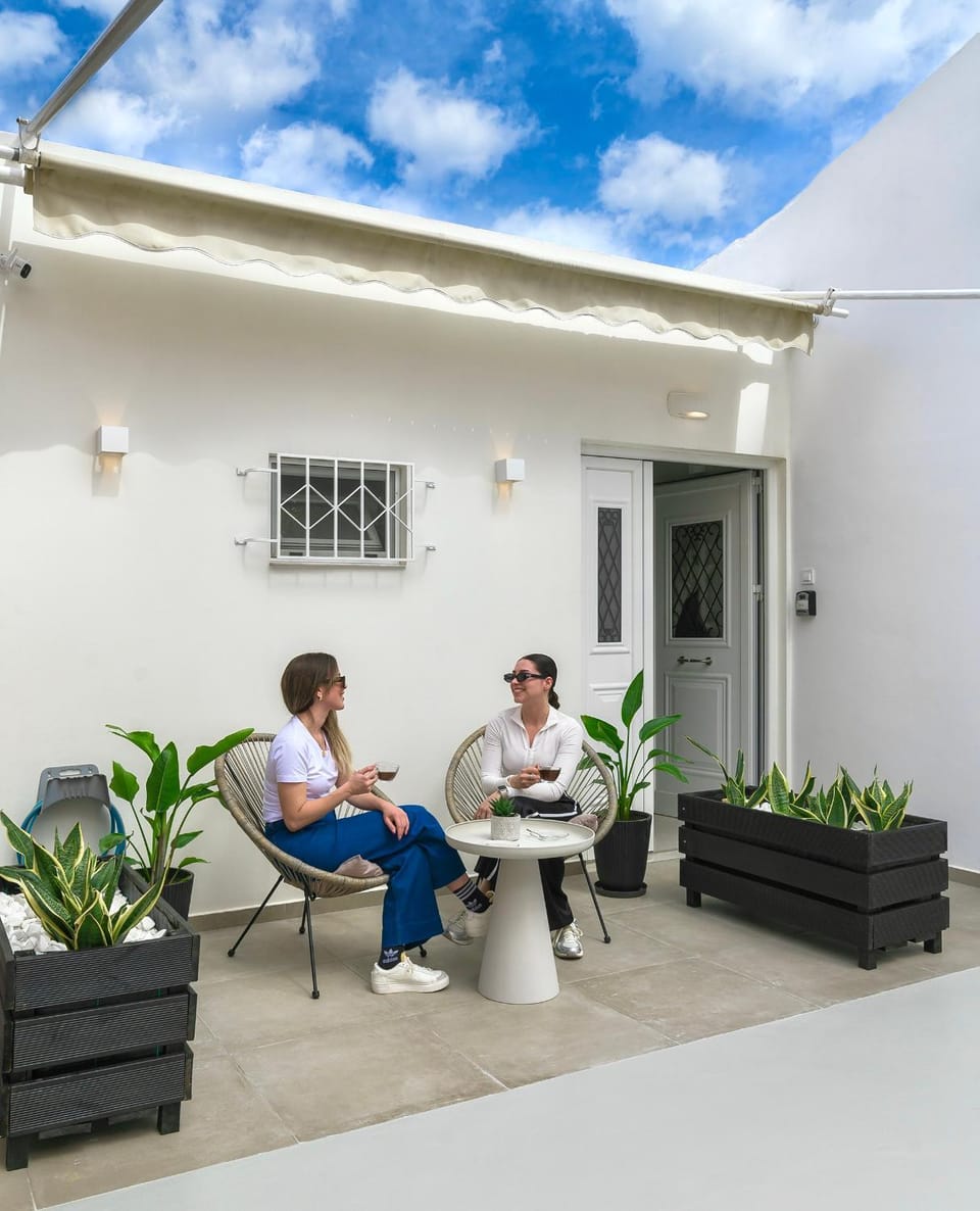 Patio, Day, People, View (from property/room), Balcony/Terrace, Seating area, Dining area, Guests, group of guests