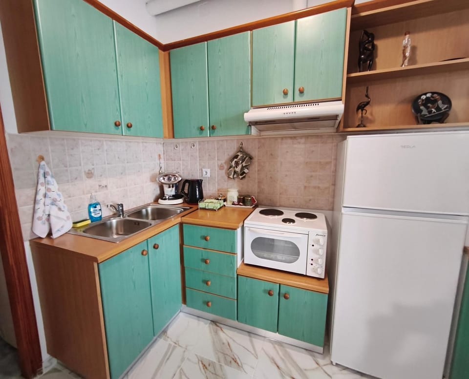Kitchen or kitchenette, stove