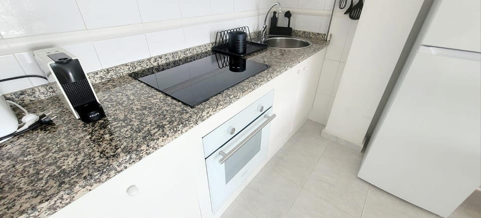 Kitchen or kitchenette, stove