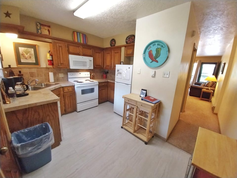 Kitchen or kitchenette, furniture, microwave, oven, stove, kitchen