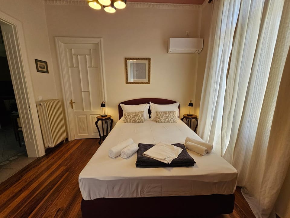 Bed, Photo of the whole room, Bedroom, towels, air conditioner