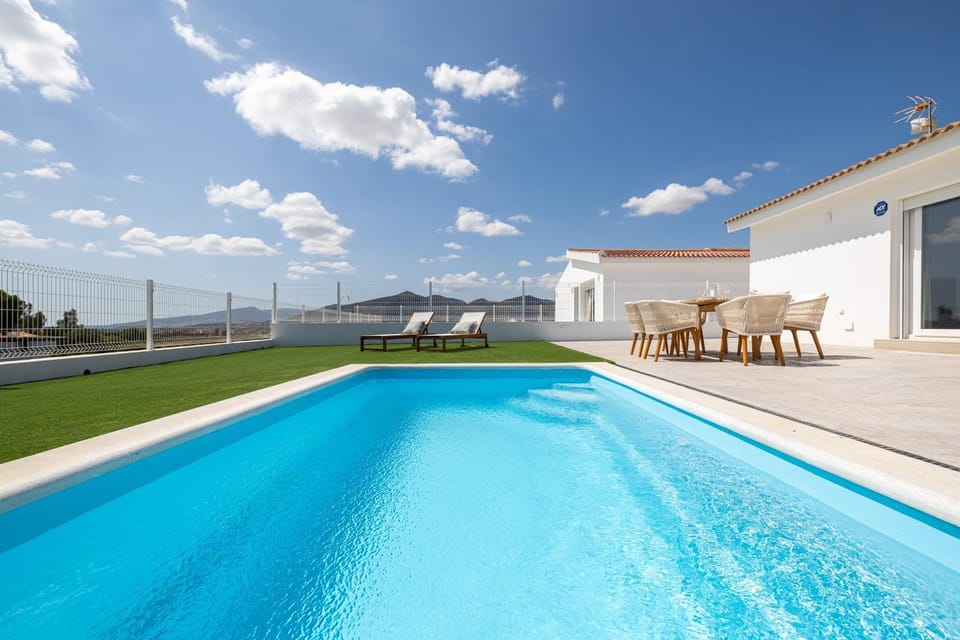 Property building, Patio, Swimming pool, sunbed