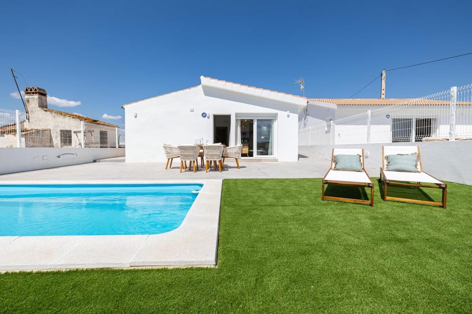 Property building, Patio, Swimming pool, sunbed
