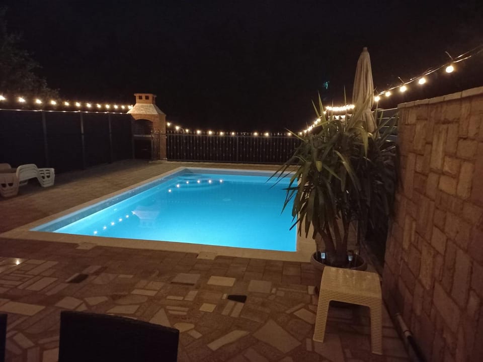 Night, Pool view, Swimming pool, sunbed