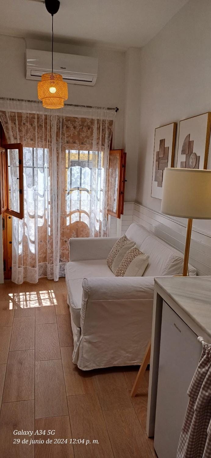 Photo of the whole room, air conditioner
