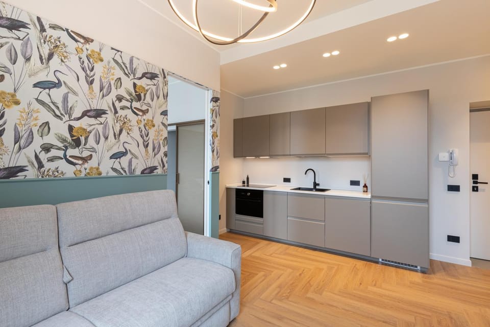 Kitchen or kitchenette, dishwasher, oven, stove