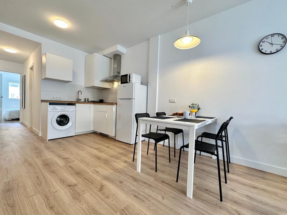 Dining area, microwave, washing machine, kitchen