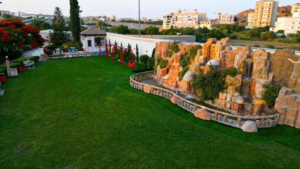 Property building, Nearby landmark, Day, Natural landscape, Garden, City view, Garden view, Landmark view