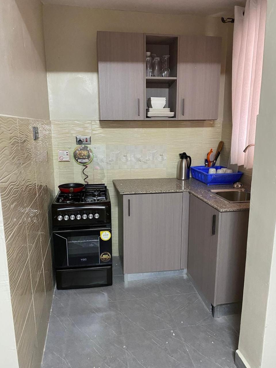 Kitchen or kitchenette, oven