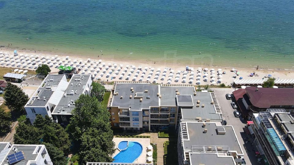 Property building, Beach, Pool view, Swimming pool