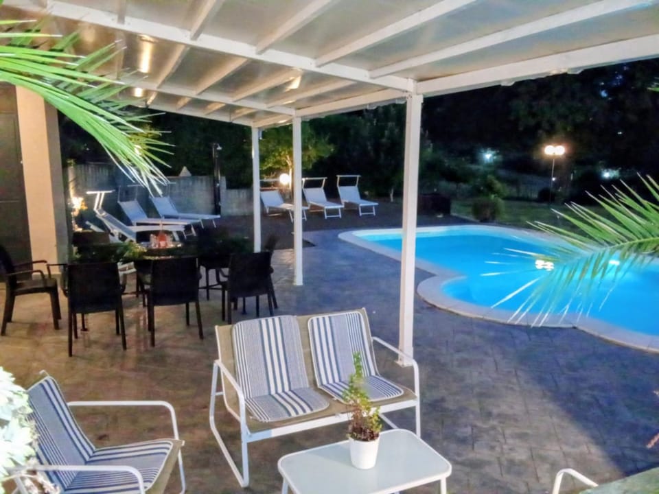 Property building, Dining area, Swimming pool