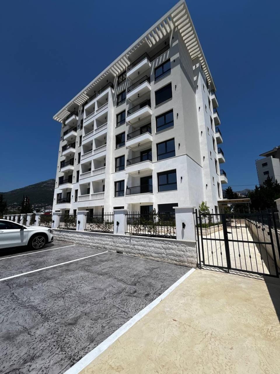 Property building, Facade/entrance, Day, Parking