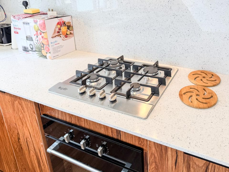 Kitchen or kitchenette, stove, kitchen