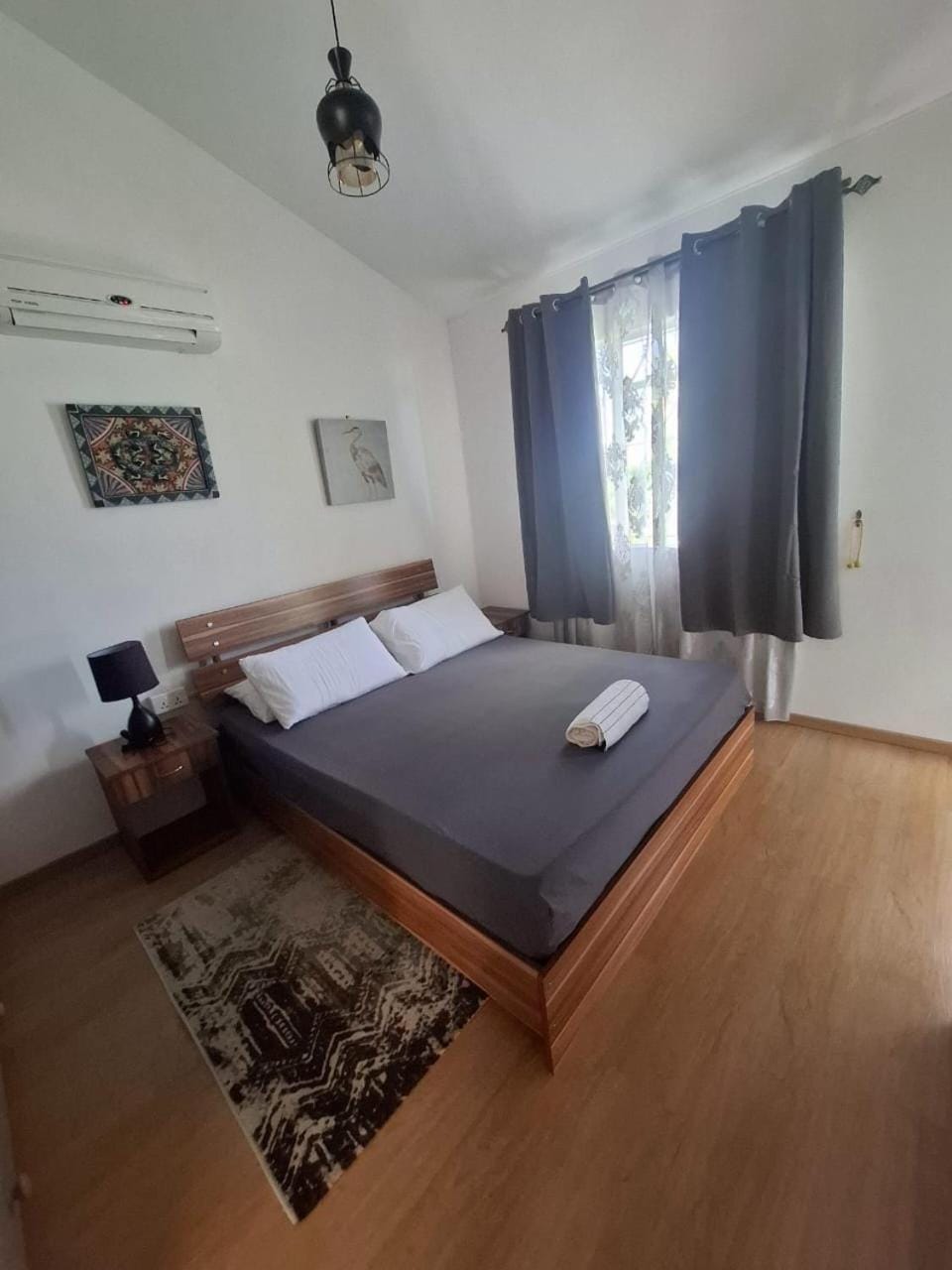 Bed, Photo of the whole room, Bedroom, towels, air conditioner