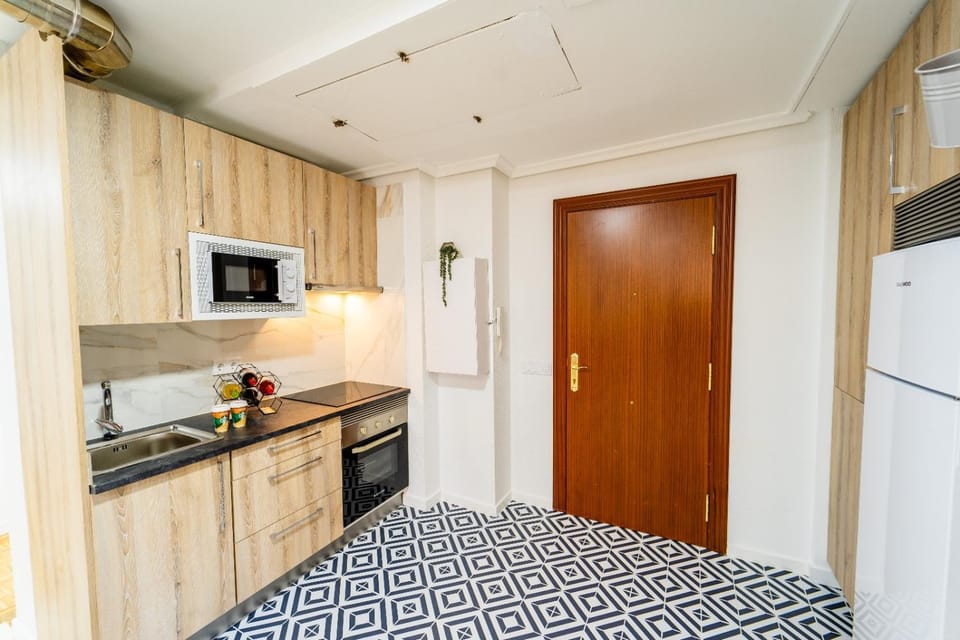 Kitchen or kitchenette, oven, stove