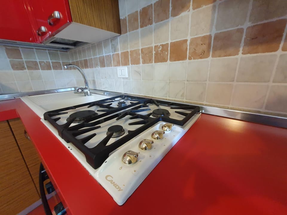 Kitchen or kitchenette, stove