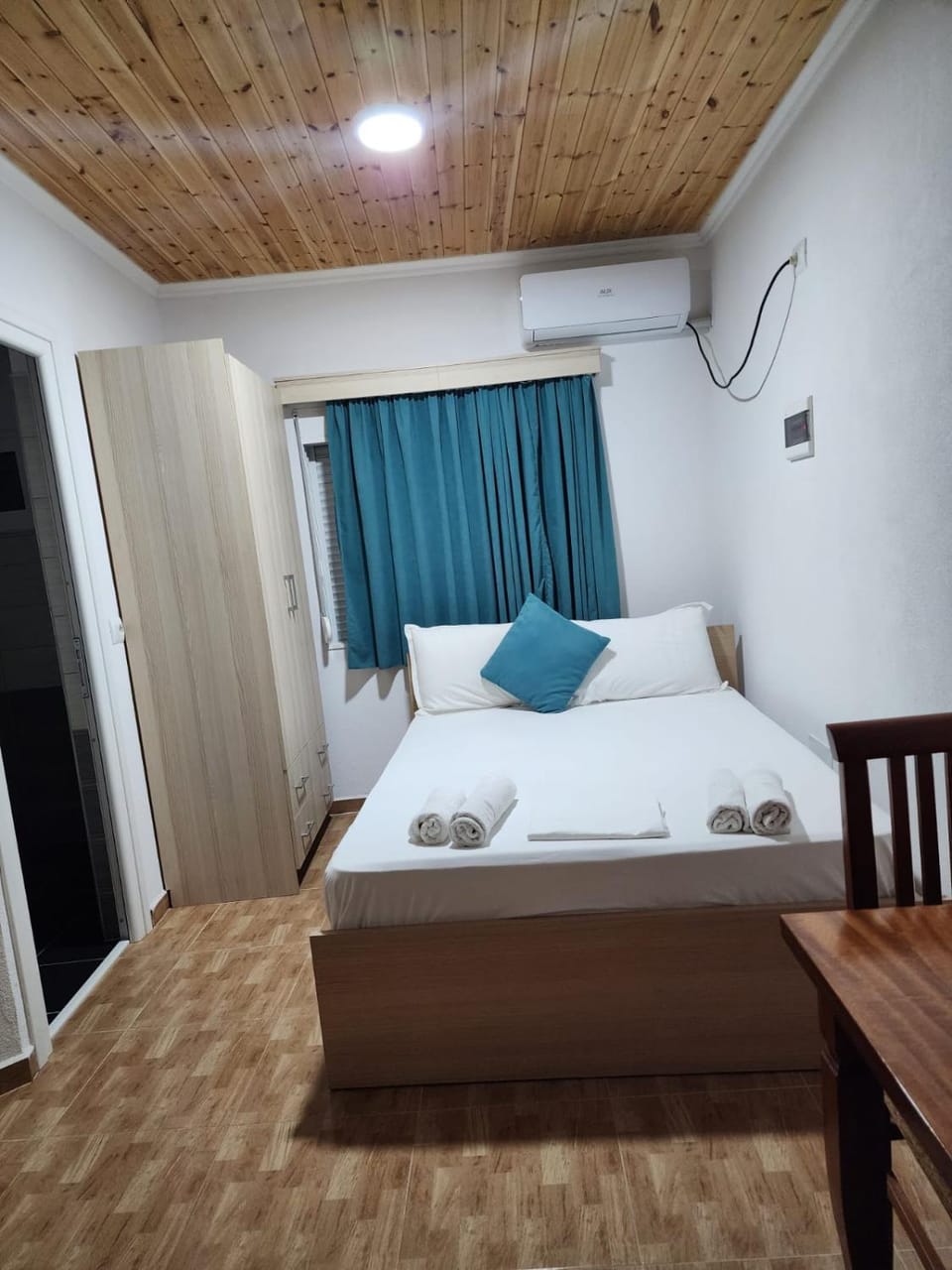 Bed, Photo of the whole room, Bedroom, towels, air conditioner