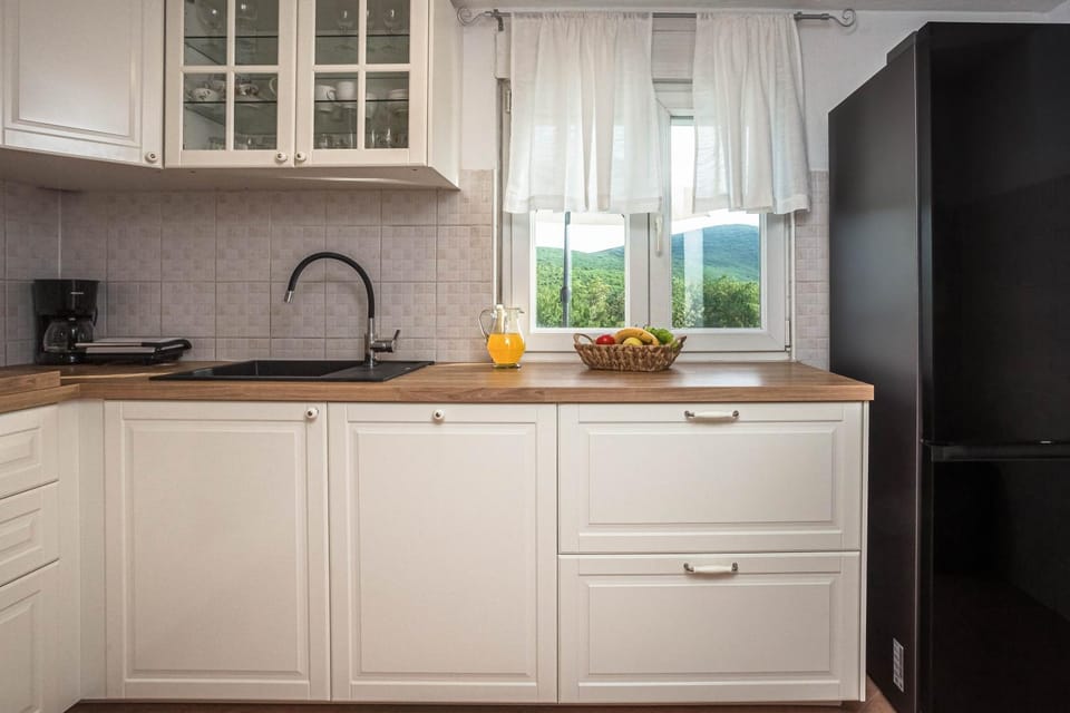 Kitchen or kitchenette, stove