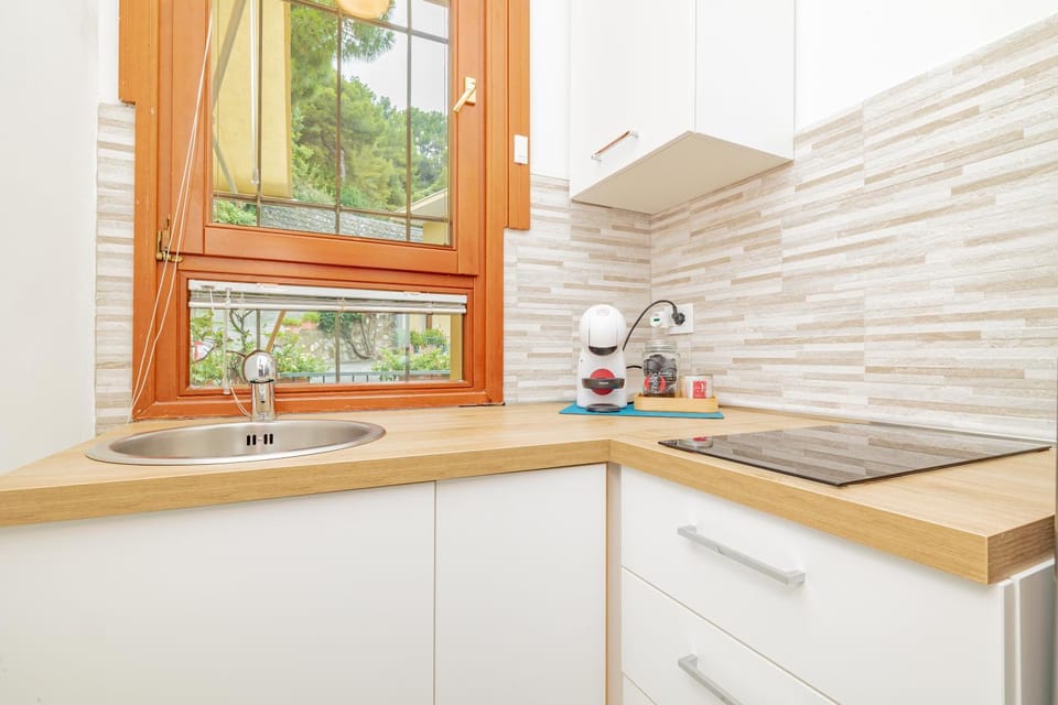 Kitchen or kitchenette, stove