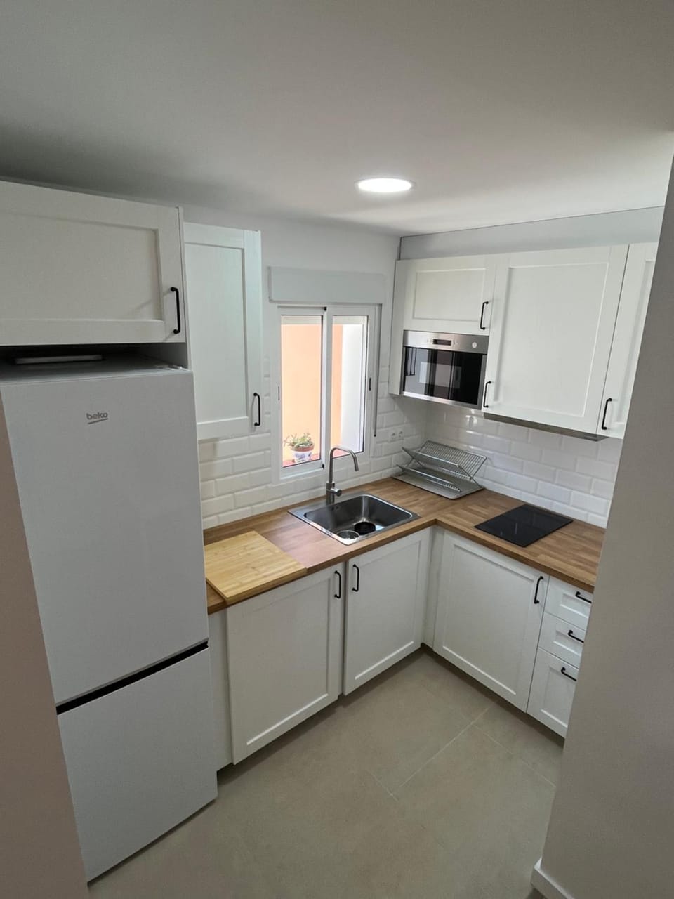 Kitchen or kitchenette, oven, stove