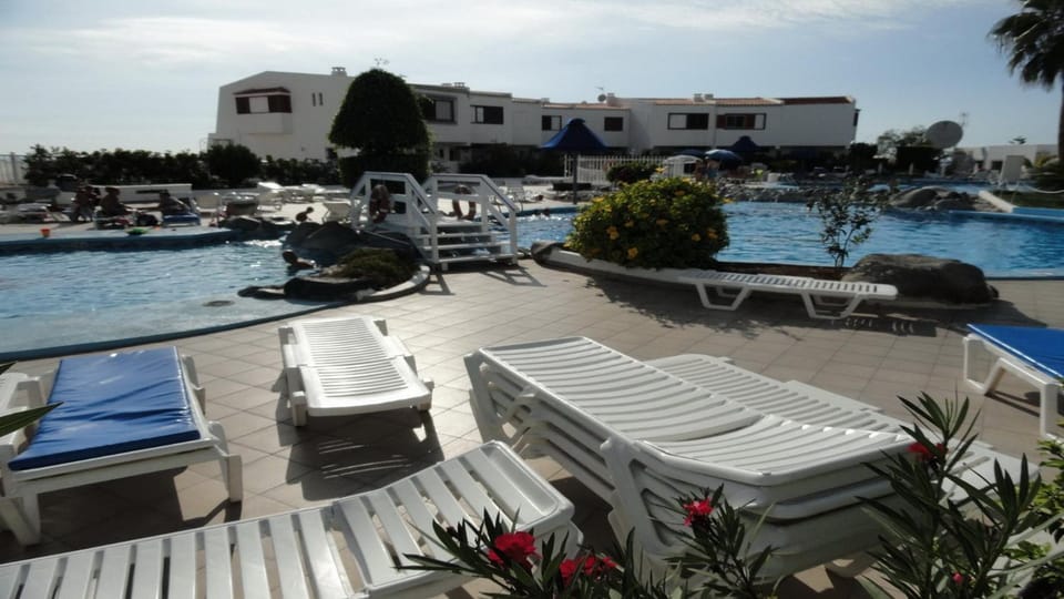 Property building, Living room, Swimming pool