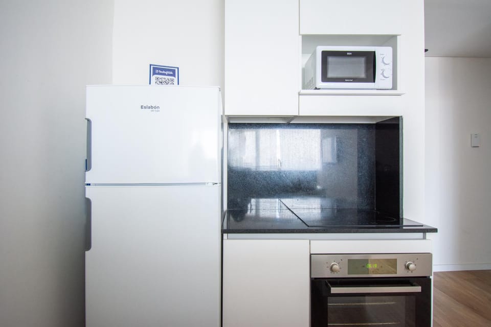 Kitchen or kitchenette, oven, stove