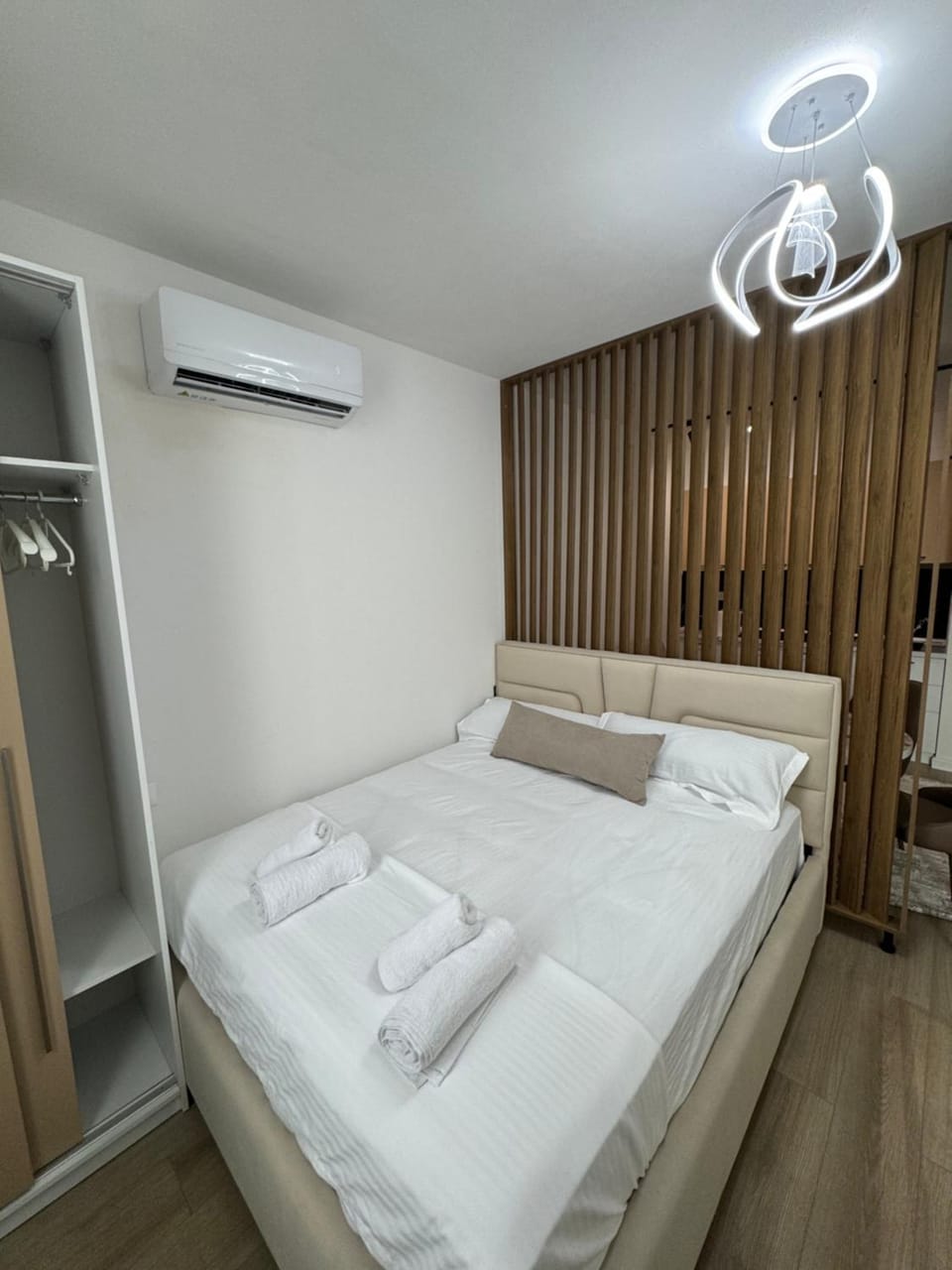 Photo of the whole room, Bedroom, towels, air conditioner