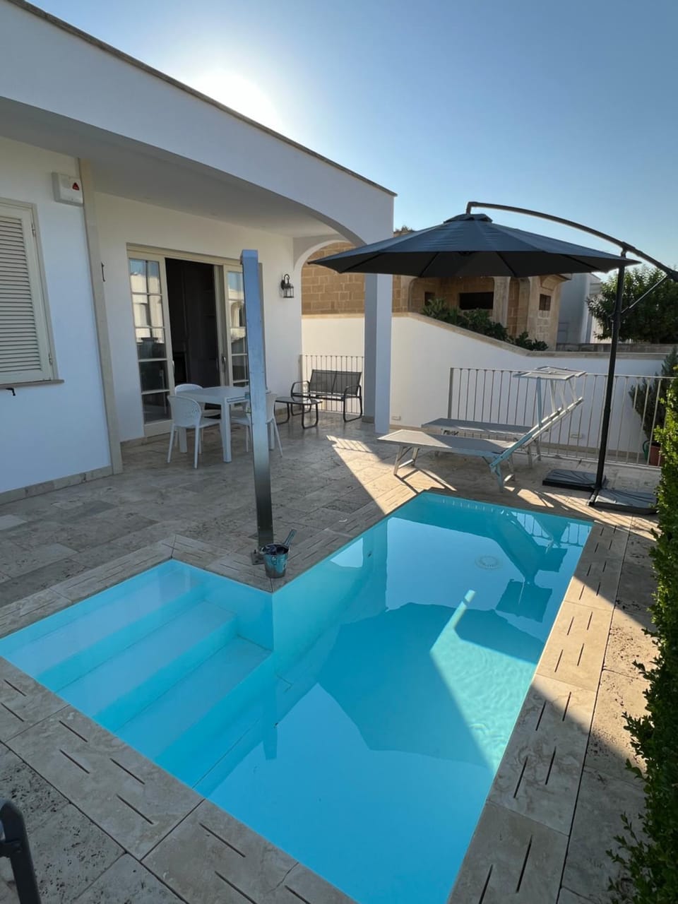 Swimming pool, sunbed